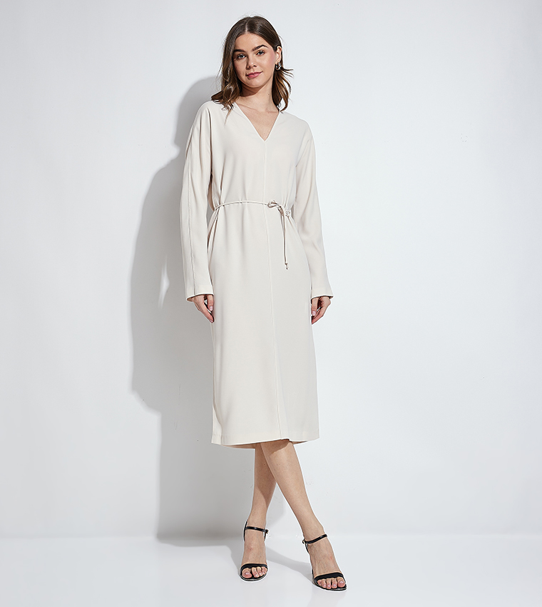 Buy Calvin Klein Solid Belted V Neck Midi Dress In Beige | 6thstreet Qatar Buy Calvin Klein Solid Belted V Neck Midi Dress In Beige | 6thstreet Qatar