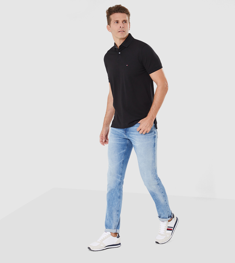 قميص بقصة بولو بلون أسود