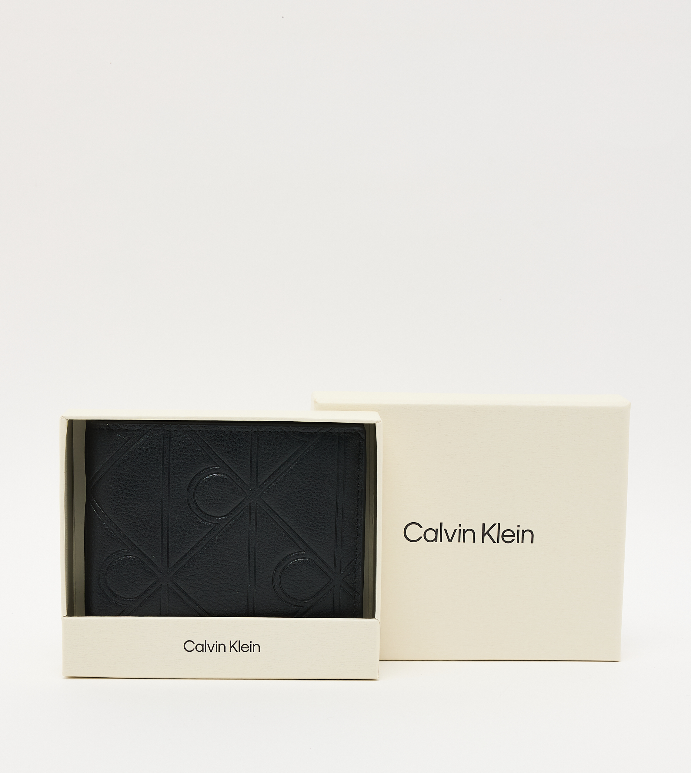 Monogram Debossed Bi-Fold Wallet