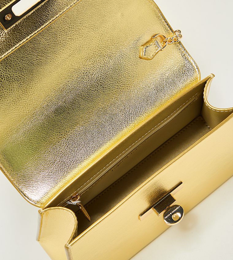 شنطة يد ميتاليك