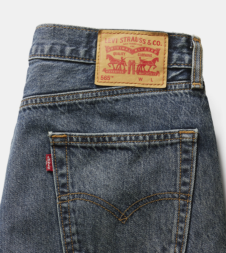 565™ Mid Rise Straight Fit Jeans