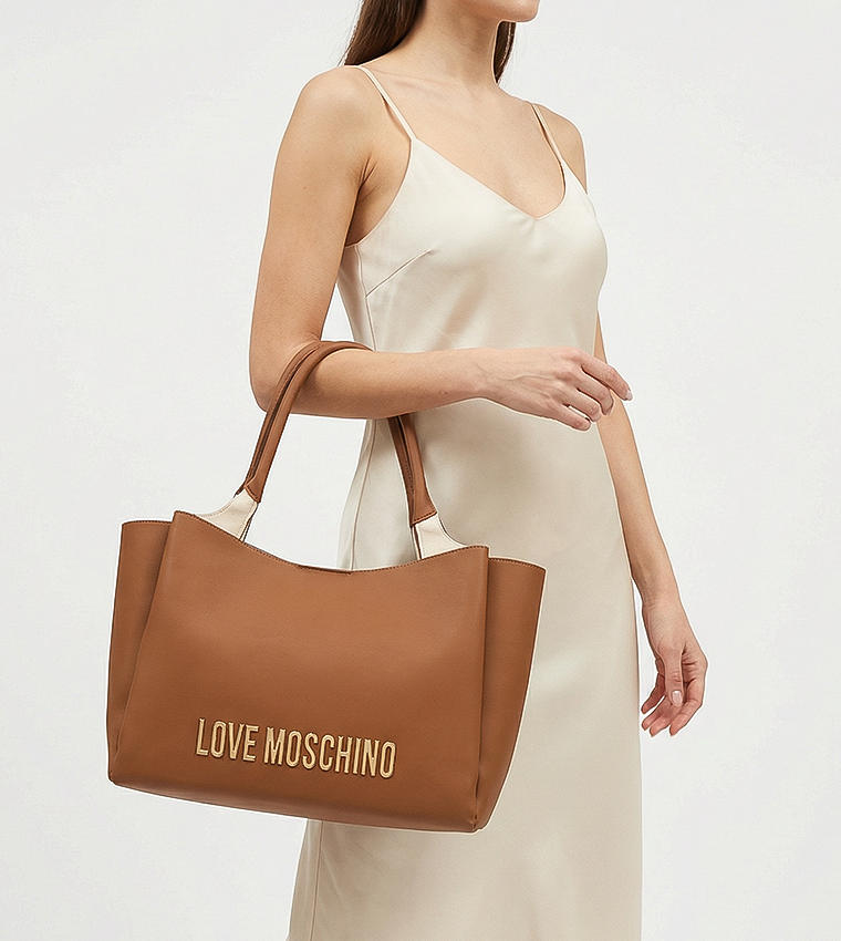 شنطة توت بشعار