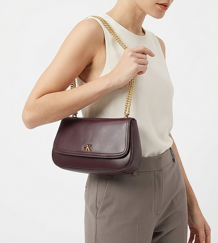 شنطة كروس بادي قابلة للتحويل بشعار