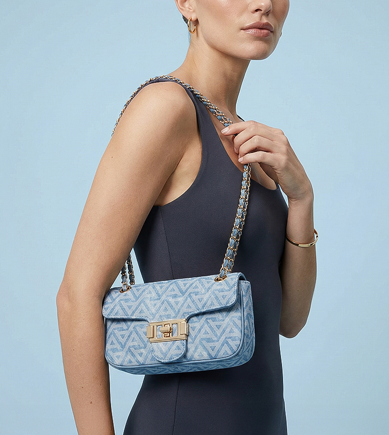 شنطة كروس بادي بنقشة مونوغرام 