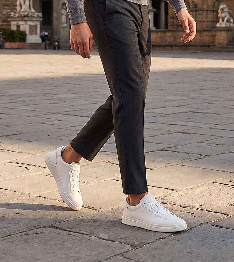 PETEY Textured Round Toe Low Top Sneakers