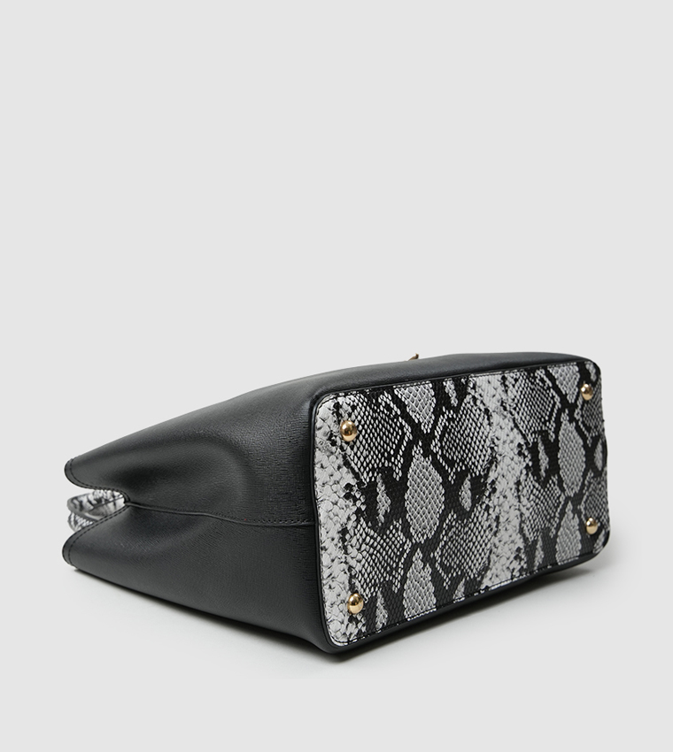 Celestina Textured Handheld Bag