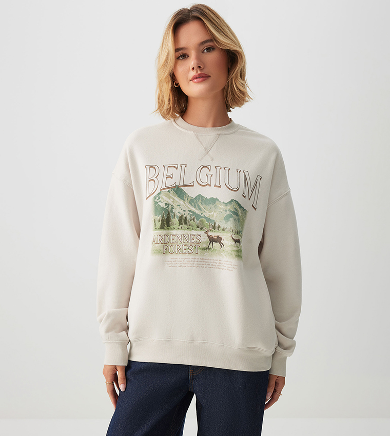 سويتشيرت برقبة مستديرة بجيوب جانبية