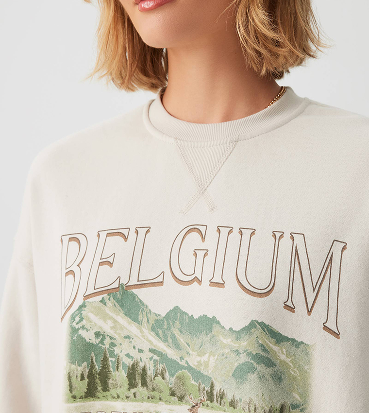 سويتشيرت برقبة مستديرة بجيوب جانبية