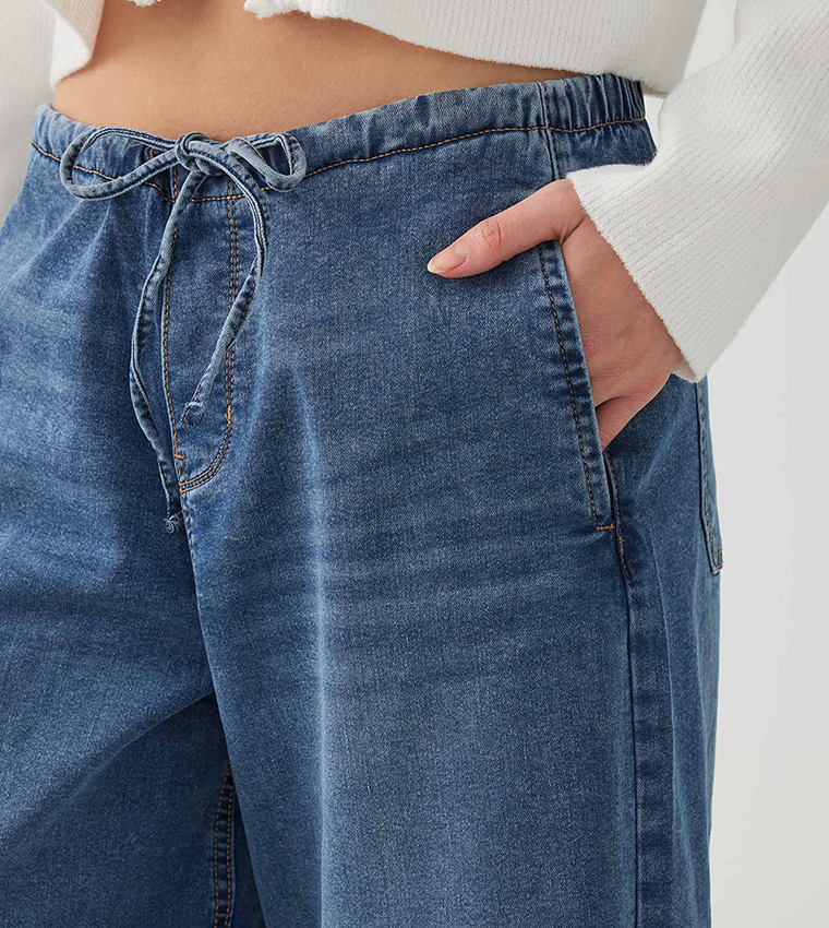 Washed Mid Rise Wide Leg Jeans