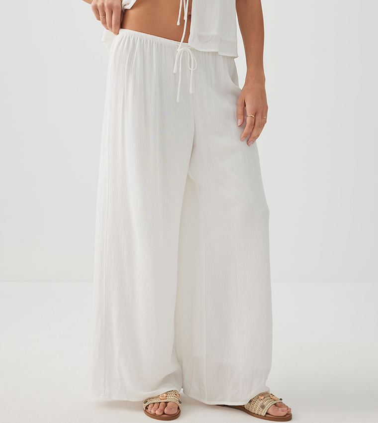 بنطلون واسع بخصر متوسط ومجعد