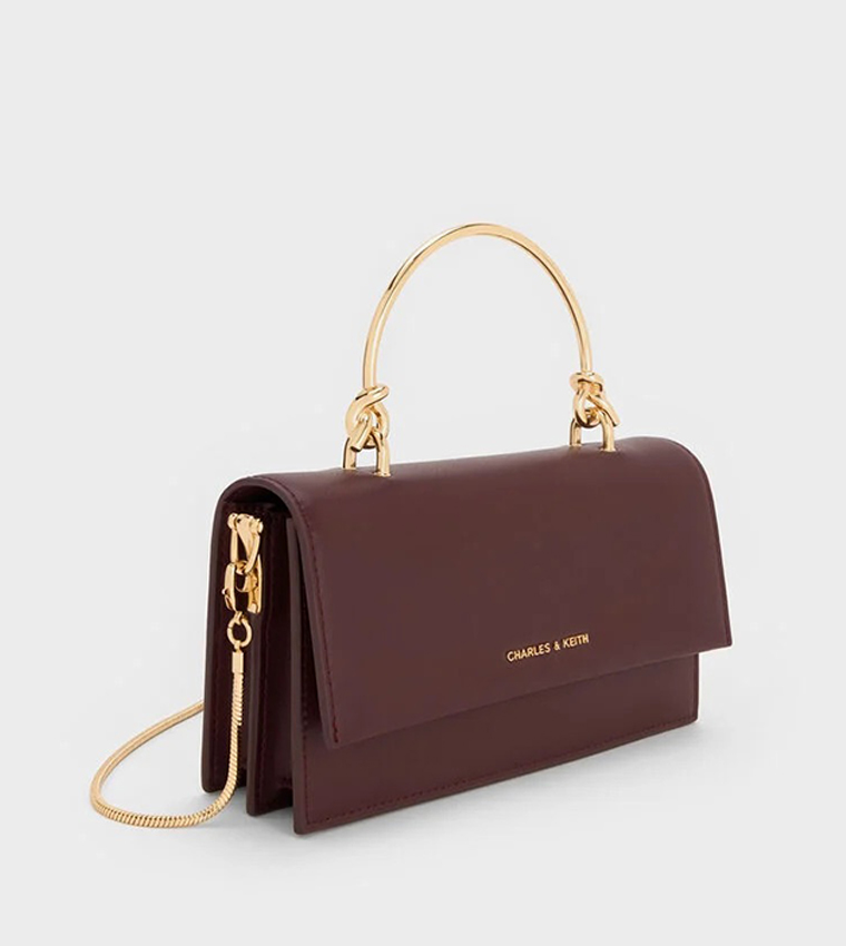 شنطة يد بشعار