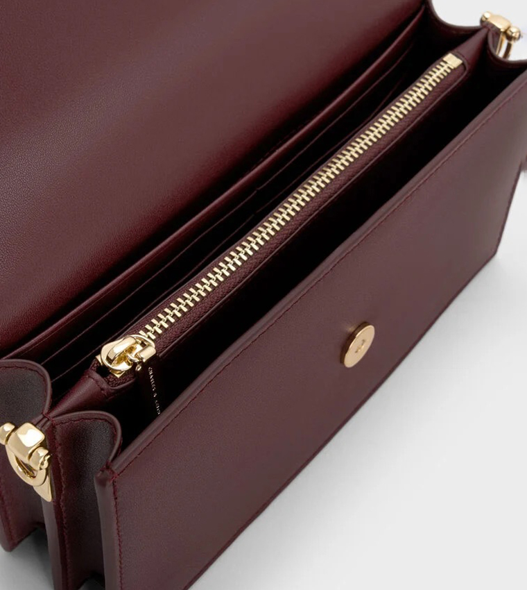 شنطة يد بشعار