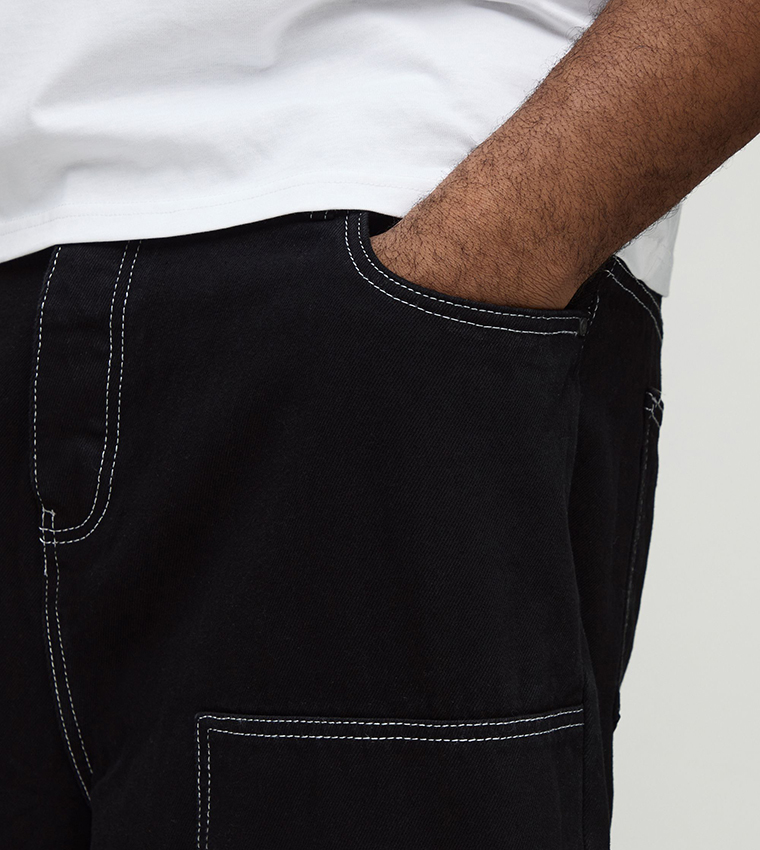 جينز بقصة مريحة للمقاسات الكبيرة والطويلة 