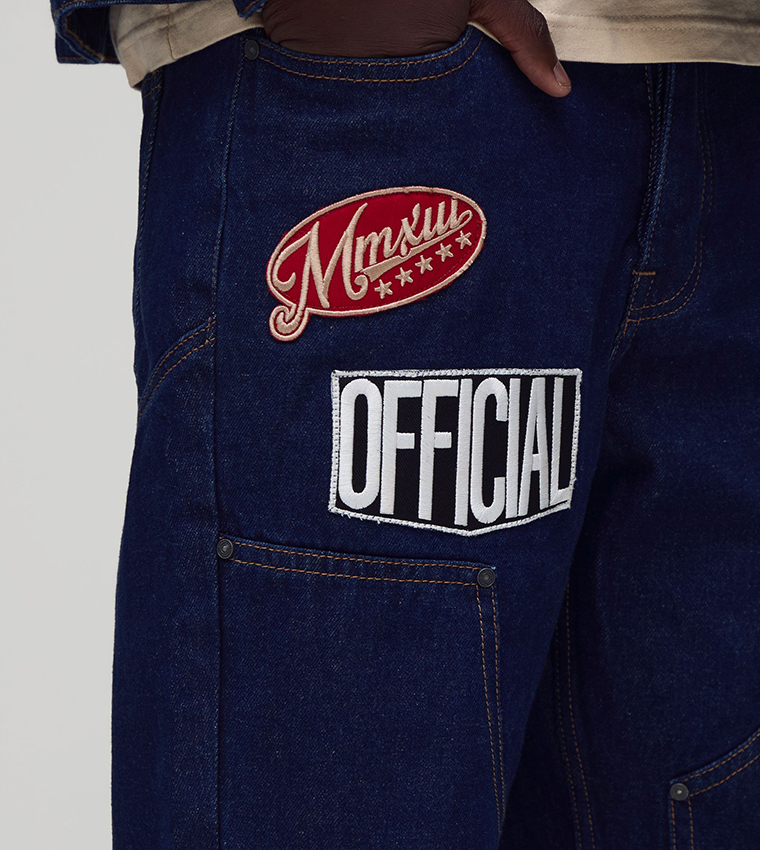 Varsity Badge Carpenter Relaxed Fit Flared Jeans