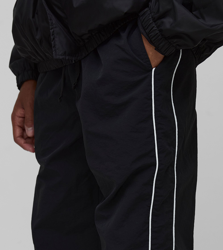 Side Striped Relaxed Fit Nylon Sweatpants