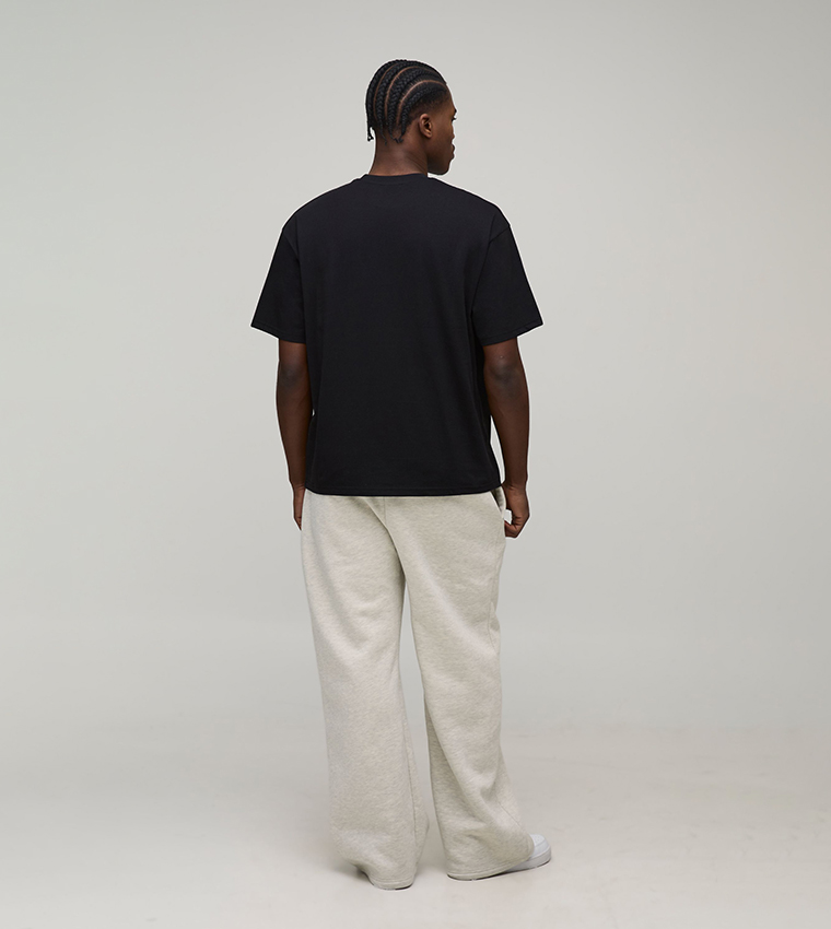 تيشيرت أوفرسايز ثقيل بطبعة