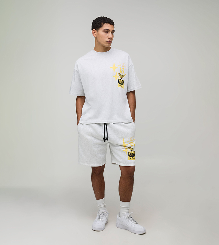 طقم تيشيرت اوفرسايز بطبعة دراجة وشورت 