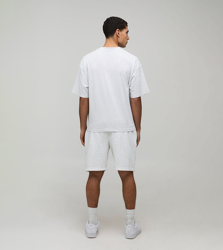 طقم تيشيرت اوفرسايز بطبعة دراجة وشورت 