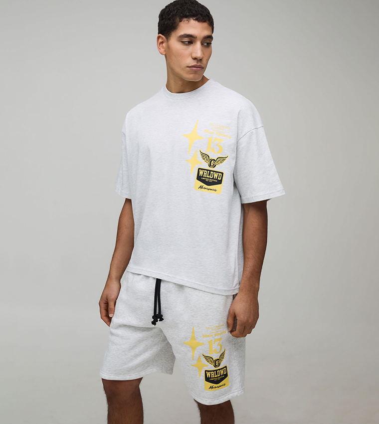 طقم تيشيرت اوفرسايز بطبعة دراجة وشورت 