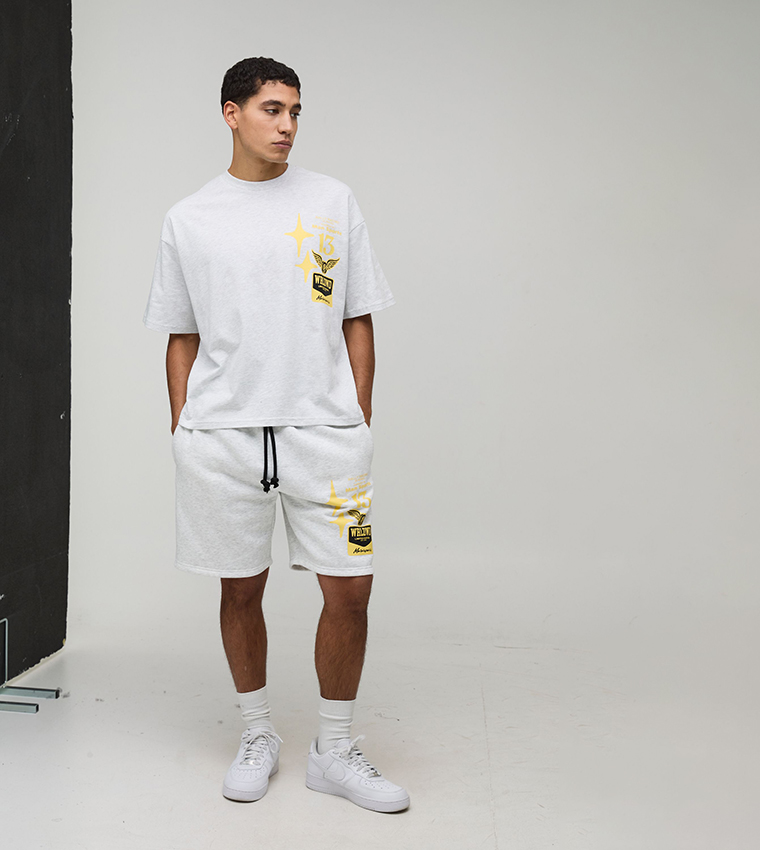 طقم تيشيرت اوفرسايز بطبعة دراجة وشورت 