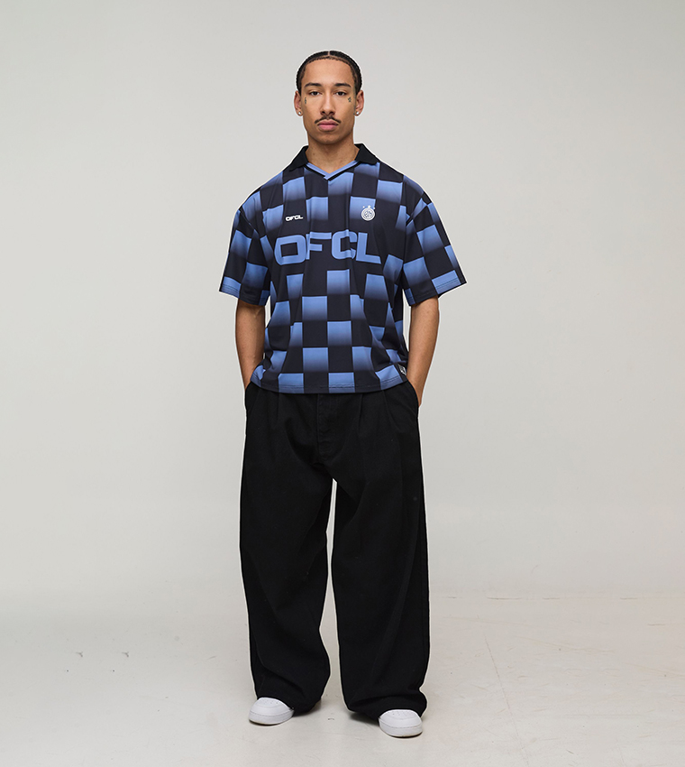 جينز واسع بكسرات امامية