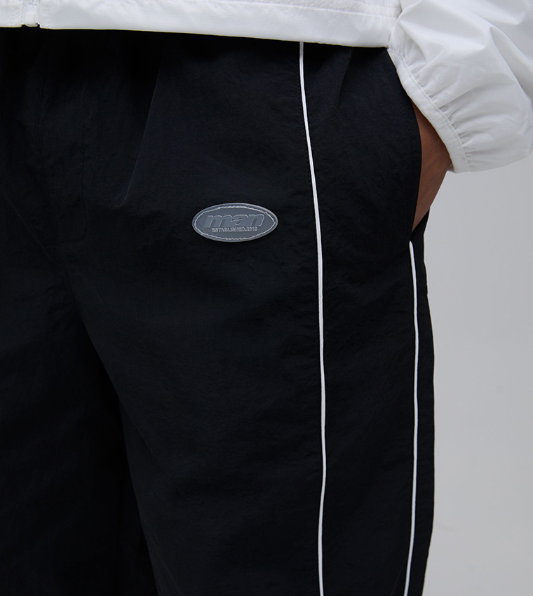 Relaxed Fit Elasticated Front Binding Toggle Hem Nylon Trousers