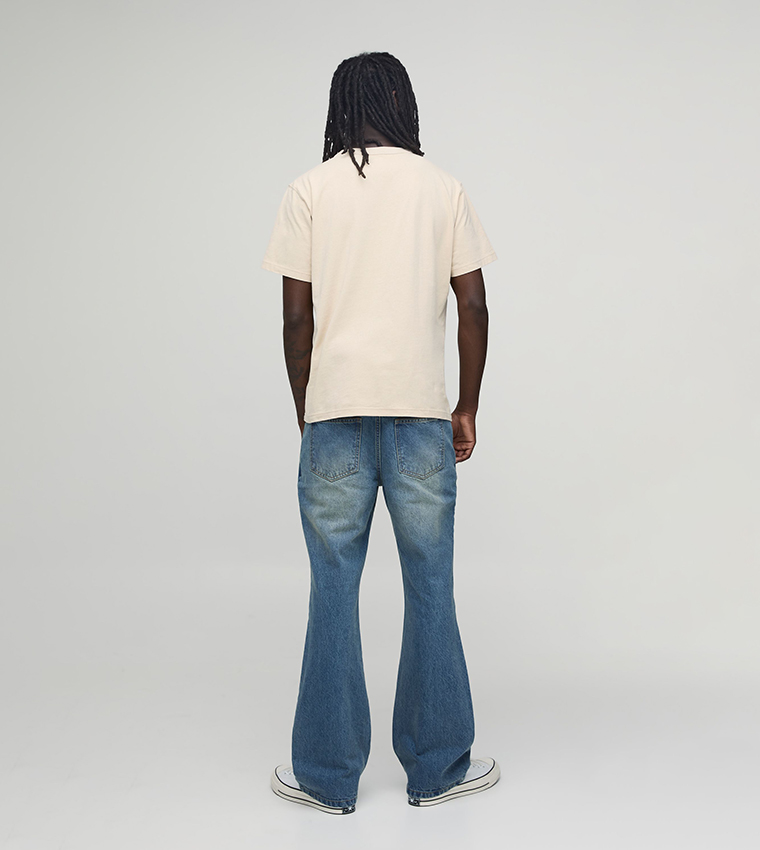 Washed Mid Rise Flared Jeans