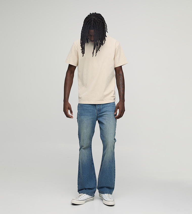 Washed Mid Rise Flared Jeans