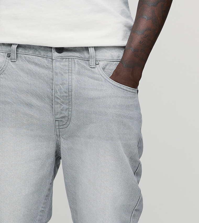 Washed Mid Rise Flared Jeans