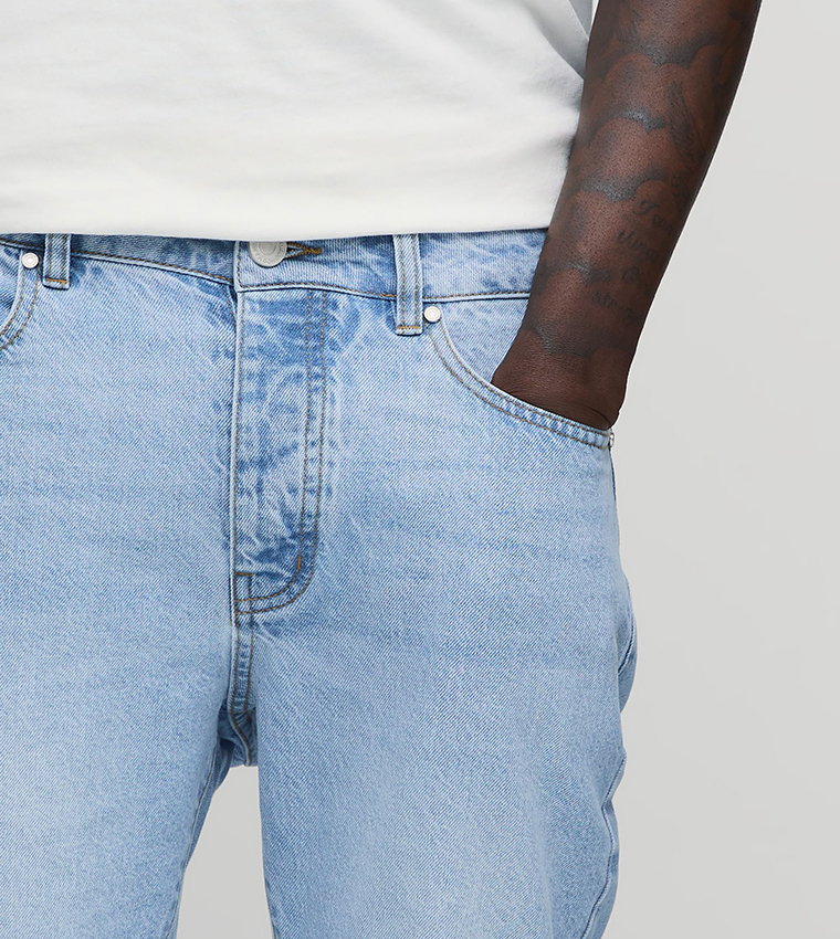 Washed Mid Rise Flared Jeans