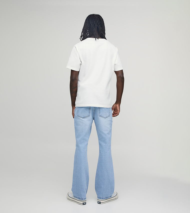 Washed Mid Rise Flared Jeans