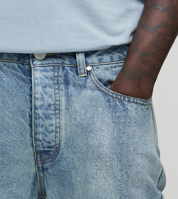 Washed Mid Rise Flared Jeans