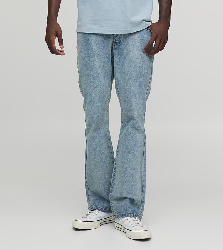 Washed Mid Rise Flared Jeans