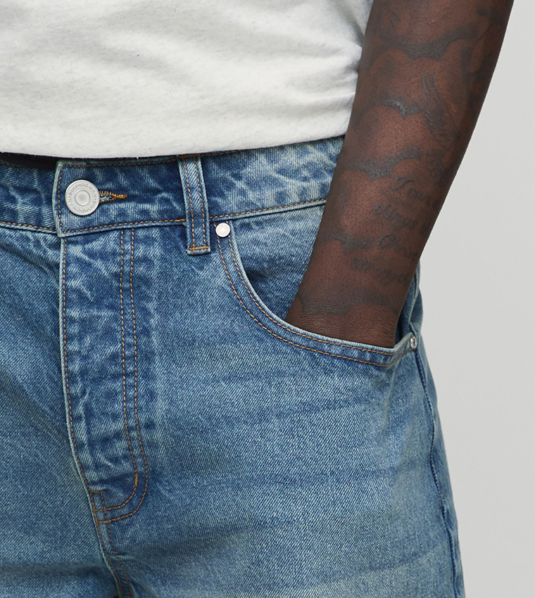 Washed Mid Rise Baggy Fit Jeans