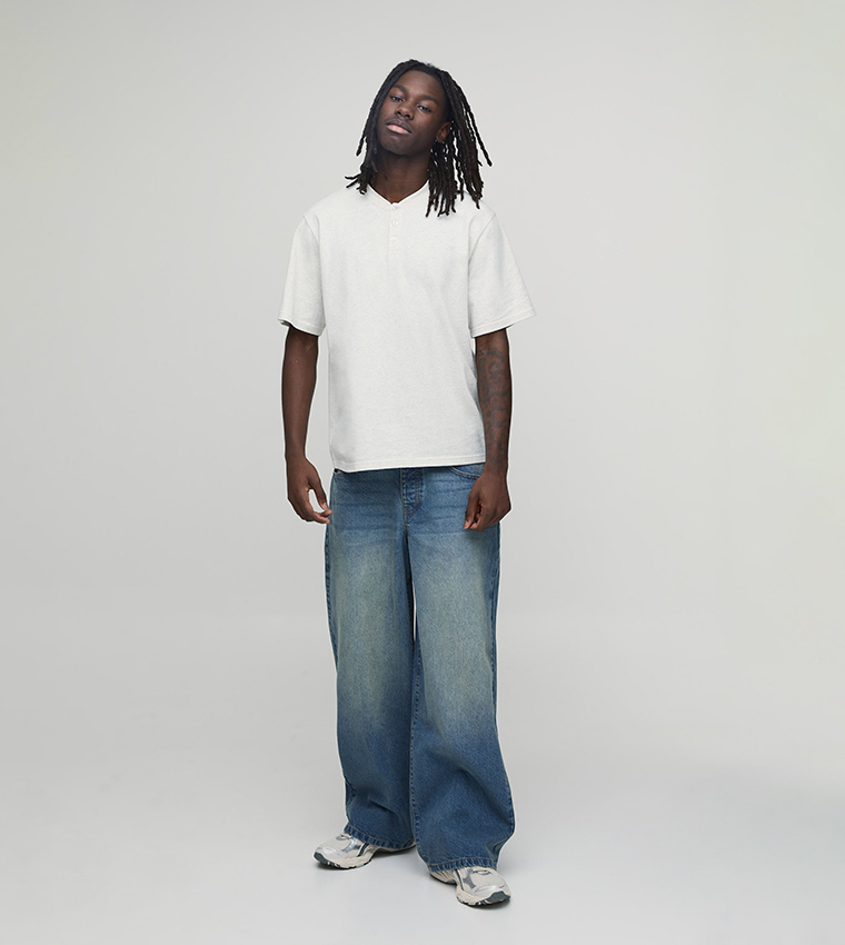 Washed Mid Rise Baggy Fit Jeans