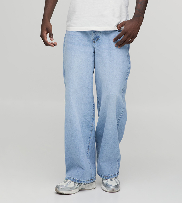 Washed Mid Rise Baggy Fit Jeans
