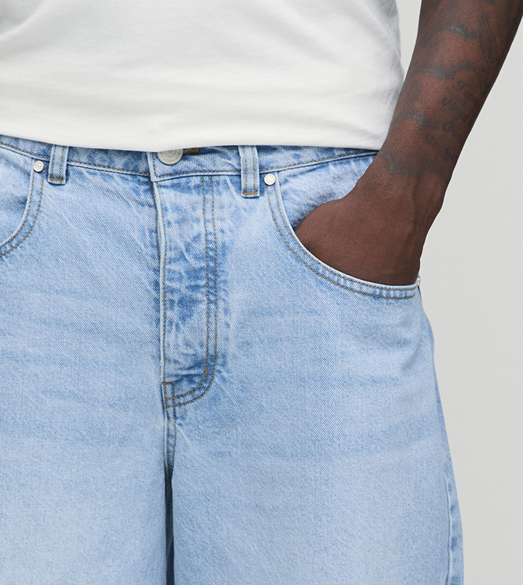 Washed Mid Rise Baggy Fit Jeans