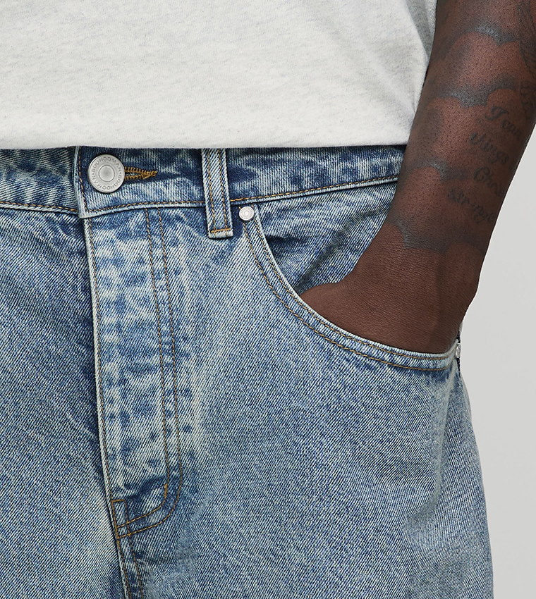 Washed Mid Rise Baggy Fit Jeans