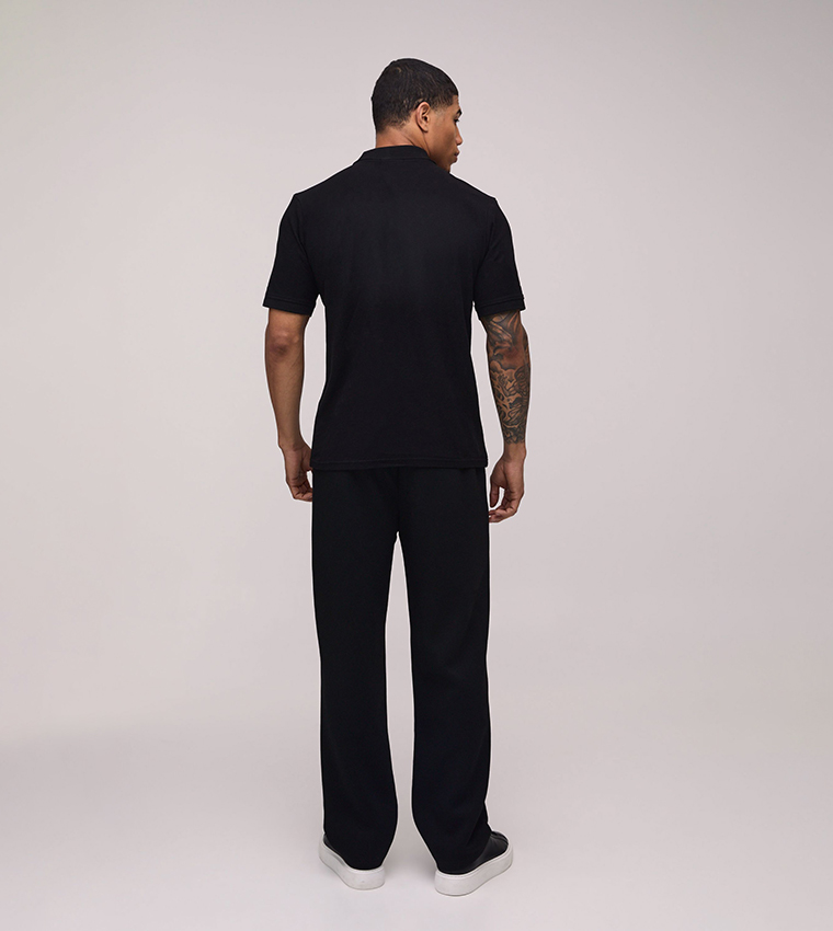 تيشيرت بولو ضيق محبوك