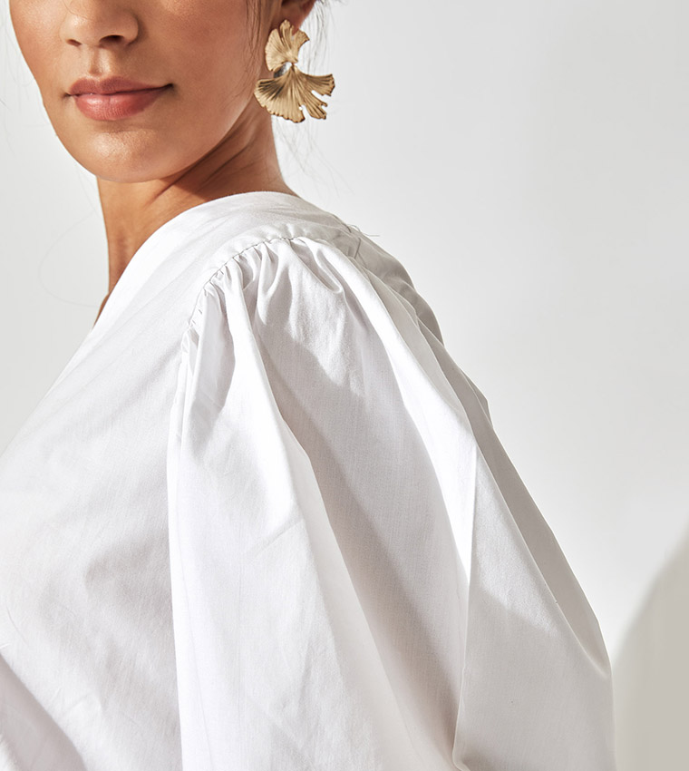 Solid V-Neck Peplum Top