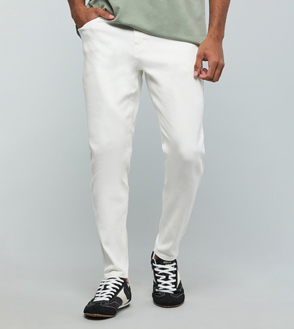 Solid Carrot Fit Jeans with Button Closure
