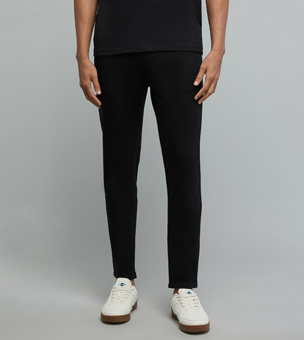 Solid Carrot Fit Jeans with Button Closure