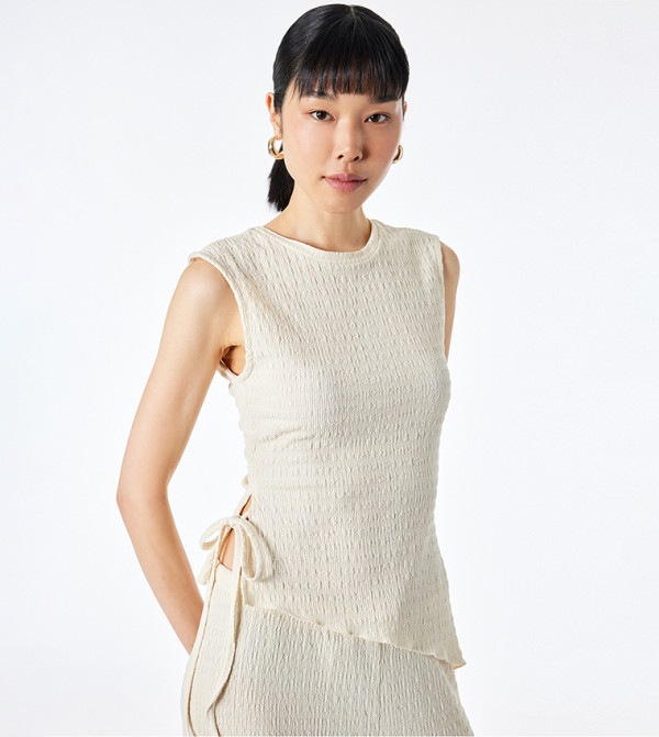 Textured Asymmetric Side Tie Top