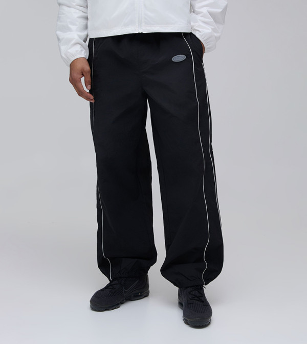 Relaxed Fit Elasticated Front Binding Toggle Hem Nylon Trousers