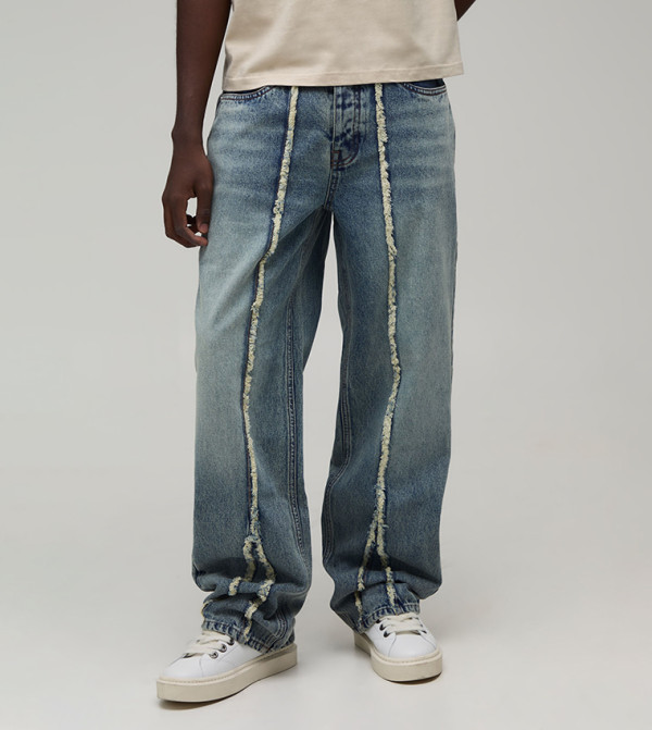 Patchwork Relaxed Fit Stacked Jeans