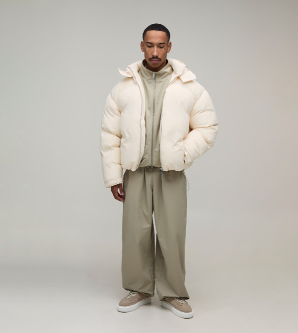 Nylon OFCL Oversized Hooded Puffer Jacket