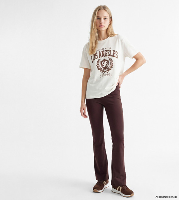 Solid Elastic Waist Flared Leggings