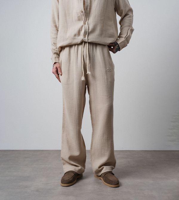 Logo Embroidered Muslin Baggy Fit Pants
