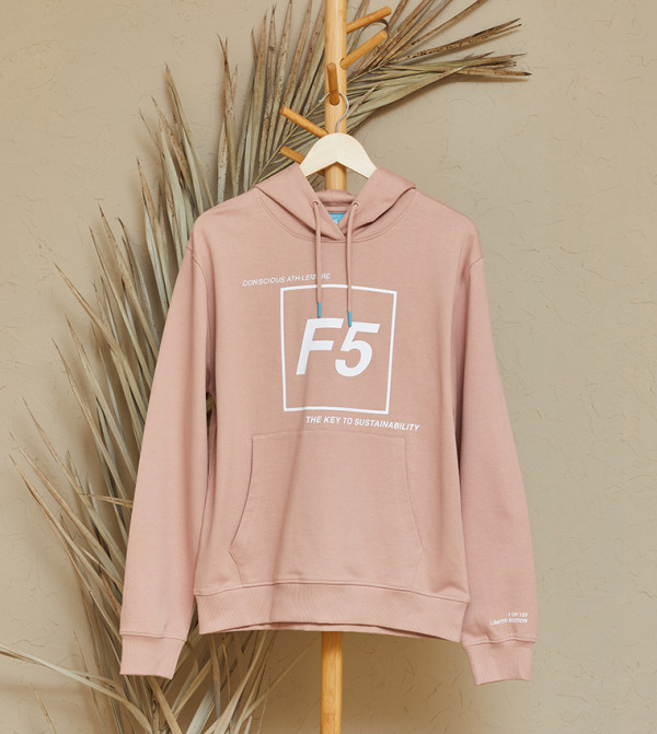 كنزة بلون زهري