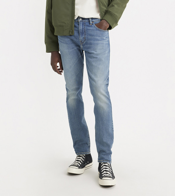 512™ Mid Tapered Jeans